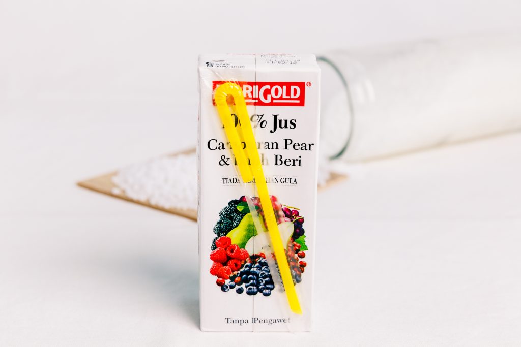 Adhesive for straw attachment refers to specialized glue used to affix straws to beverage cartons