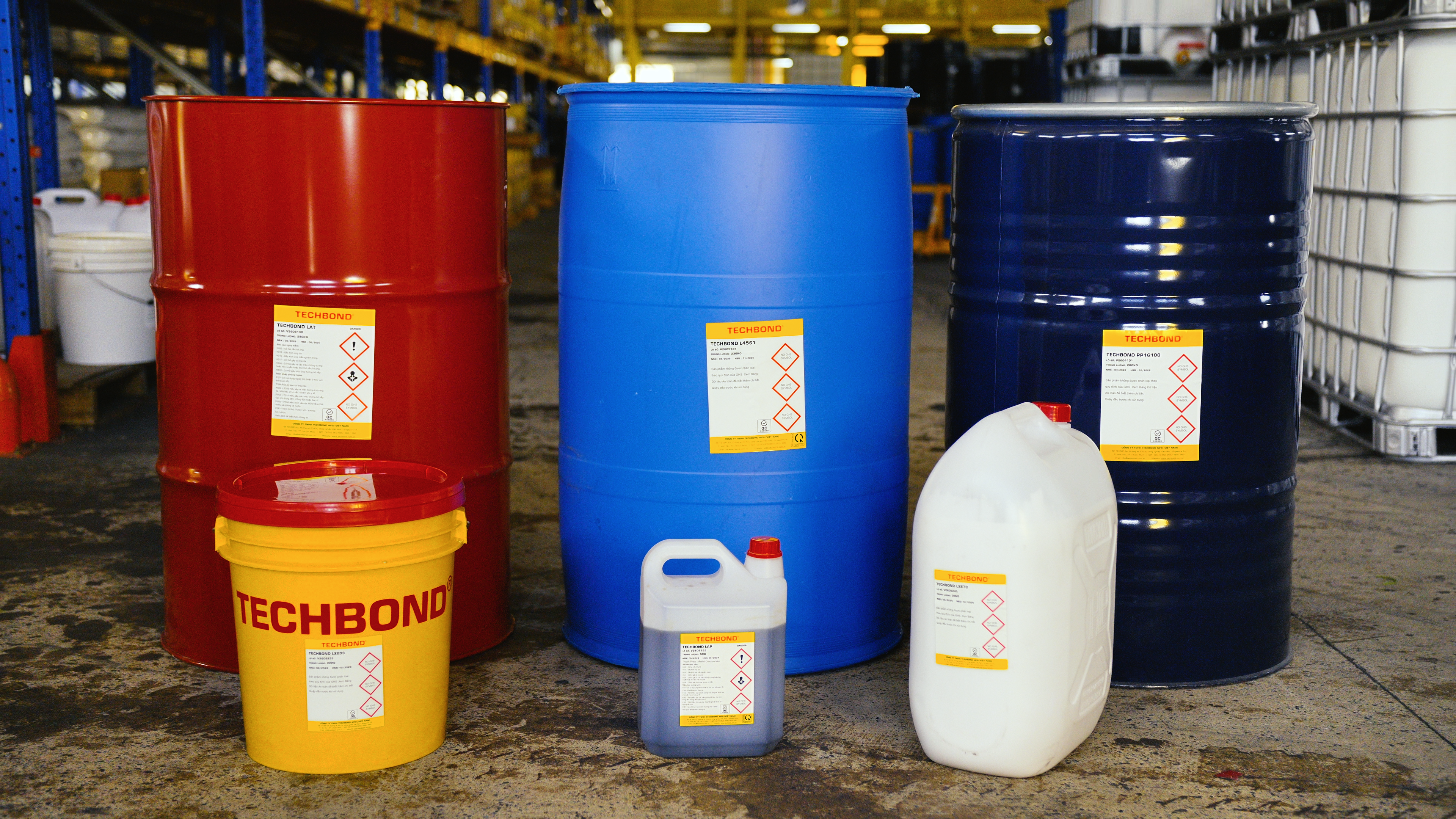 TECHBOND product drums and jerrycans in the factory warehouse
